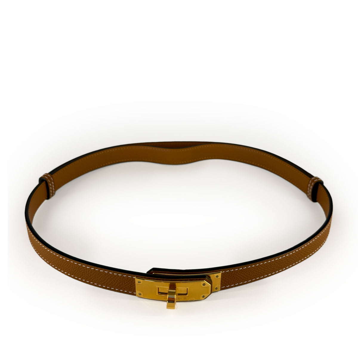 Tan leather belt with gold-tone buckle, curated Pre-loved Luxury by Myluxe in Helsinki.