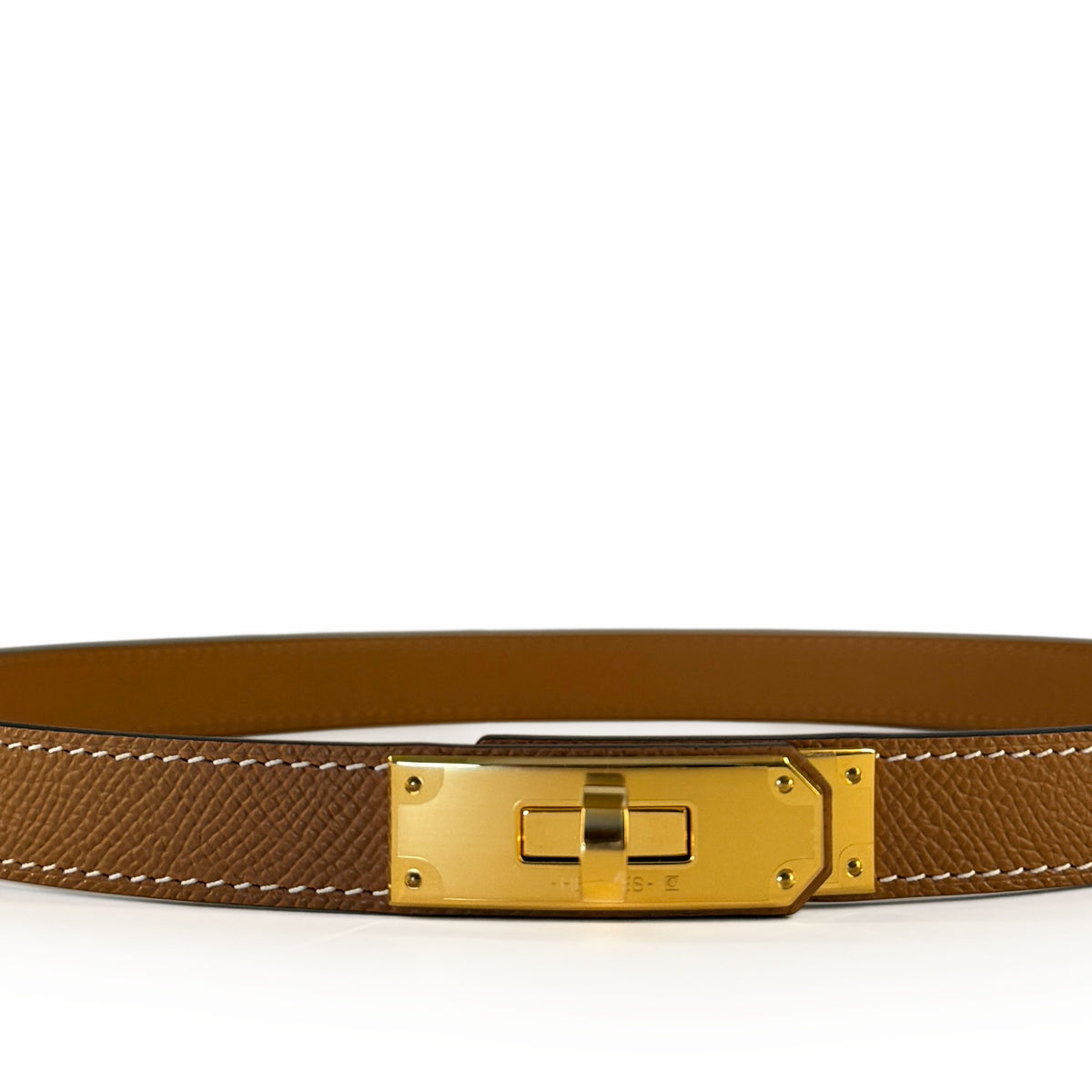 Tan leather belt with a polished gold-tone buckle, curated Pre-loved Luxury by Myluxe in Helsinki.