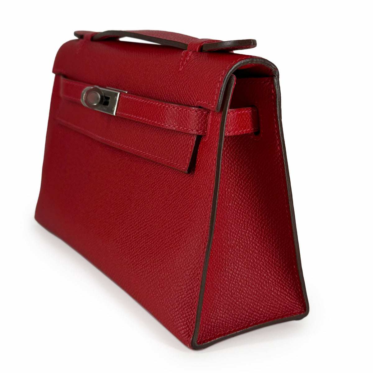 Red textured leather top handle handbag with silver hardware, curated Pre-loved Luxury by Myluxe in Helsinki.