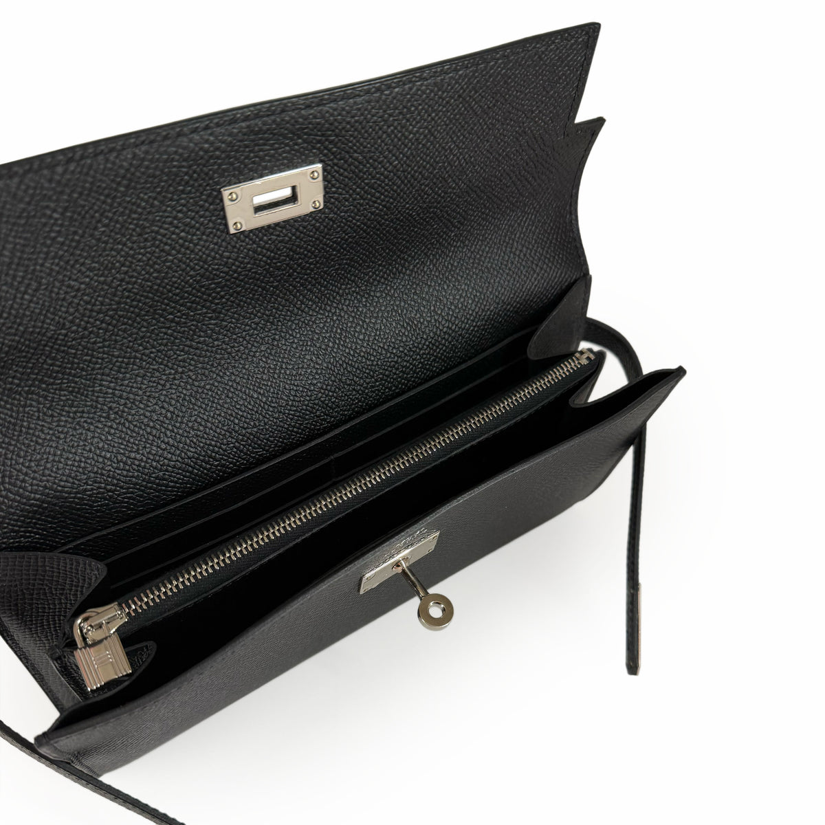 Black grained leather clutch bag with silver hardware, curated Pre-loved Luxury by Myluxe in Helsinki.