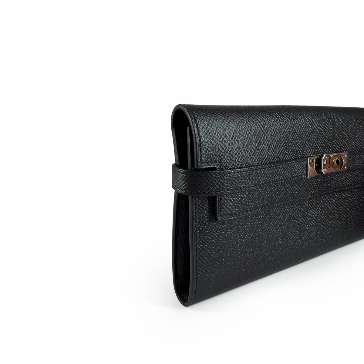 Black grained leather clutch with silver-tone metal clasp, curated Pre-loved Luxury by Myluxe in Helsinki.