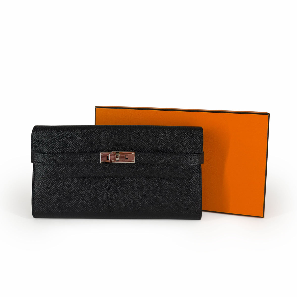 Black grained leather designer clutch with silver hardware, curated Pre-loved Luxury by Myluxe in Helsinki.