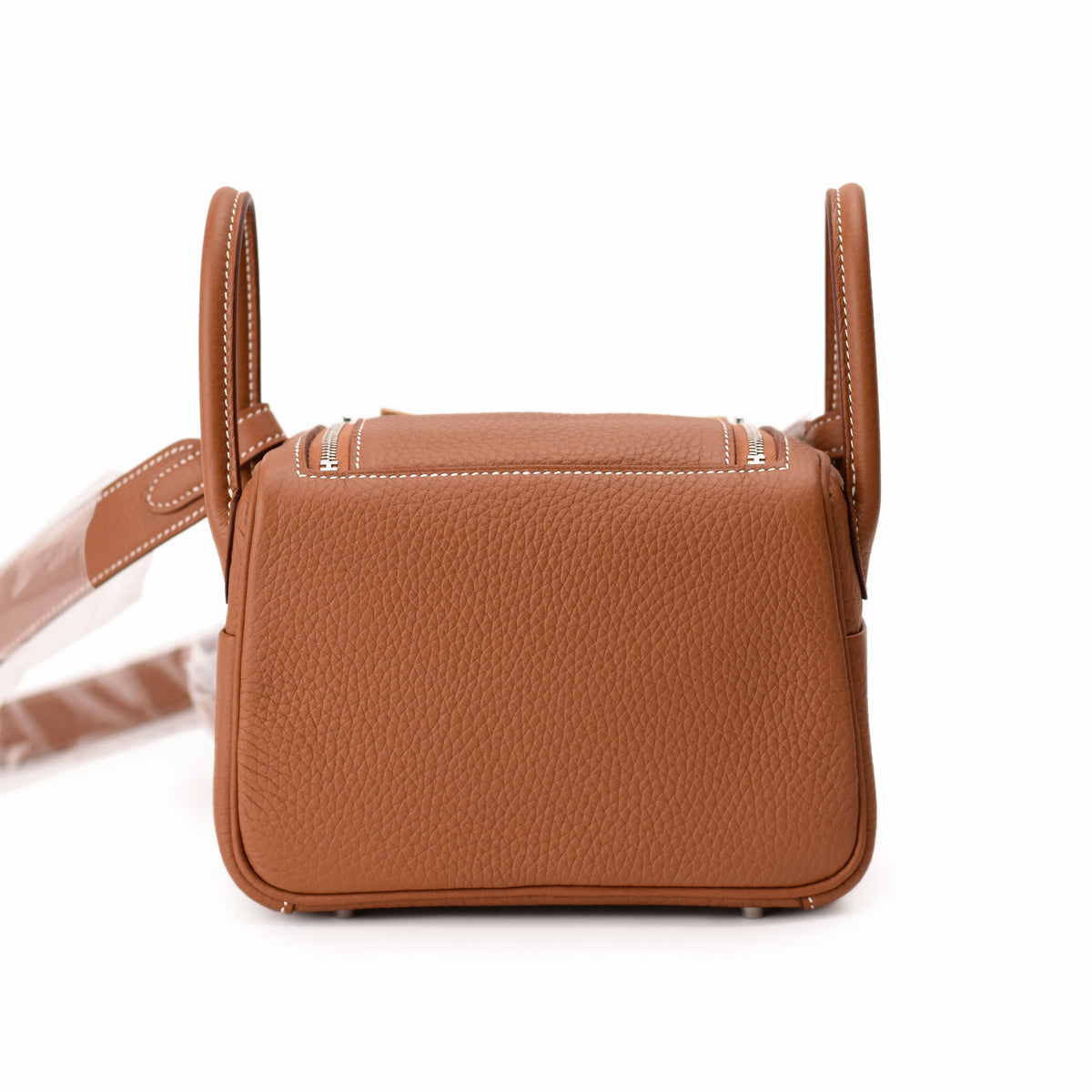 Brown pebbled leather handbag with top handles and zipper closure, curated Pre-loved Luxury by Myluxe in Helsinki.