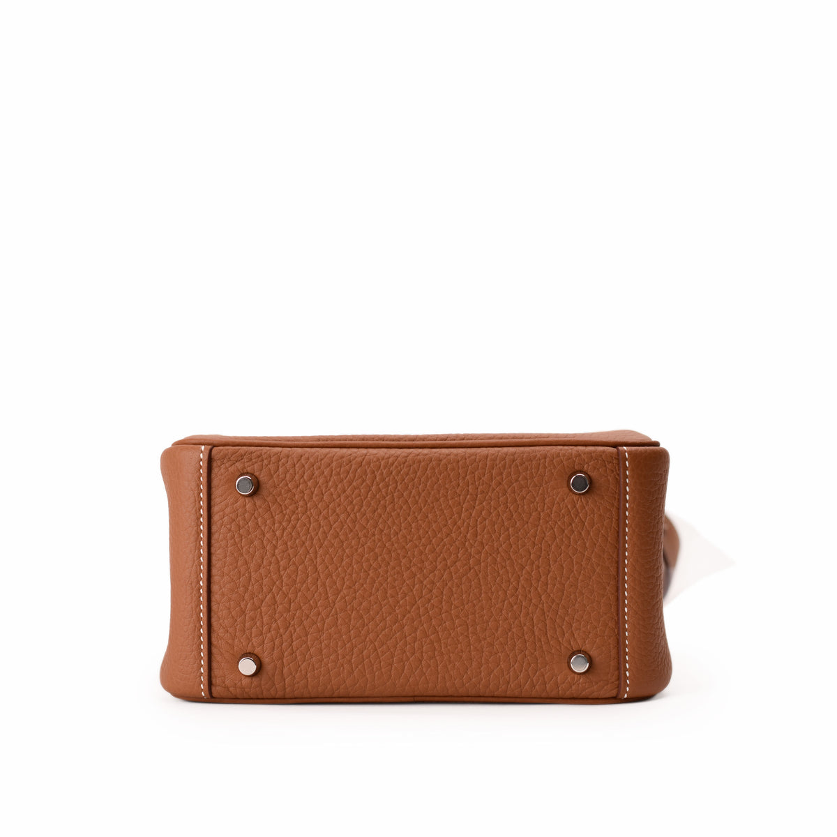 Bottom view of a tan pebbled leather luxury handbag with silver feet, curated Pre-loved Luxury by Myluxe in Helsinki.