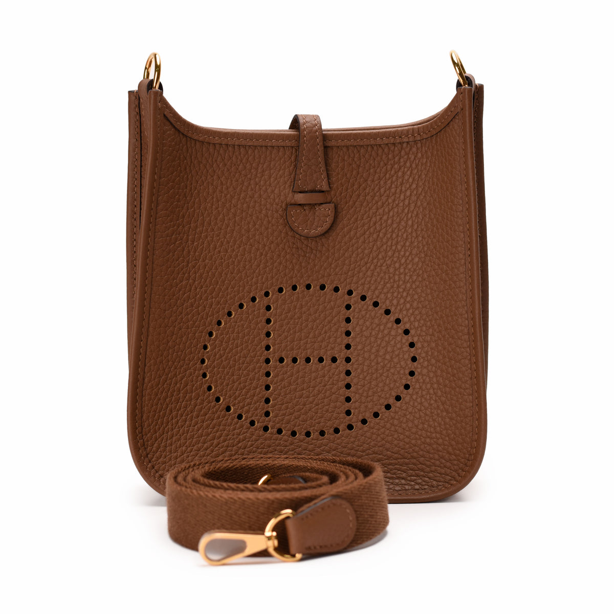 Brown pebbled leather handbag with perforated H emblem, curated Pre-loved Luxury by Myluxe in Helsinki.