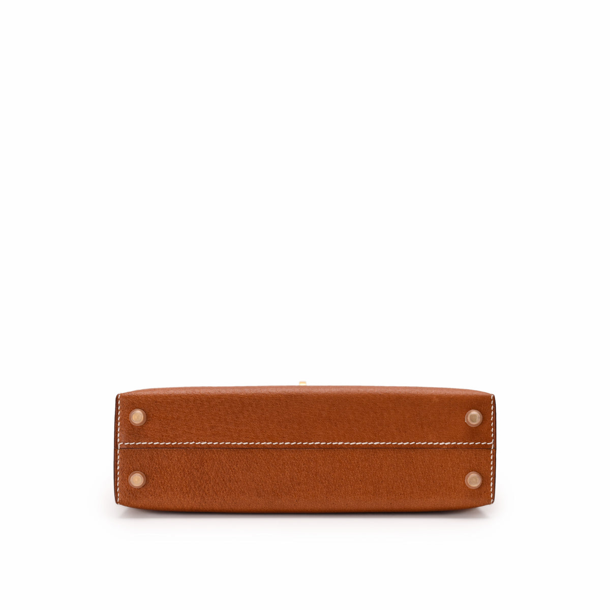 Tan leather designer handbag base with gold-tone metal feet, curated Pre-loved Luxury by Myluxe in Helsinki.