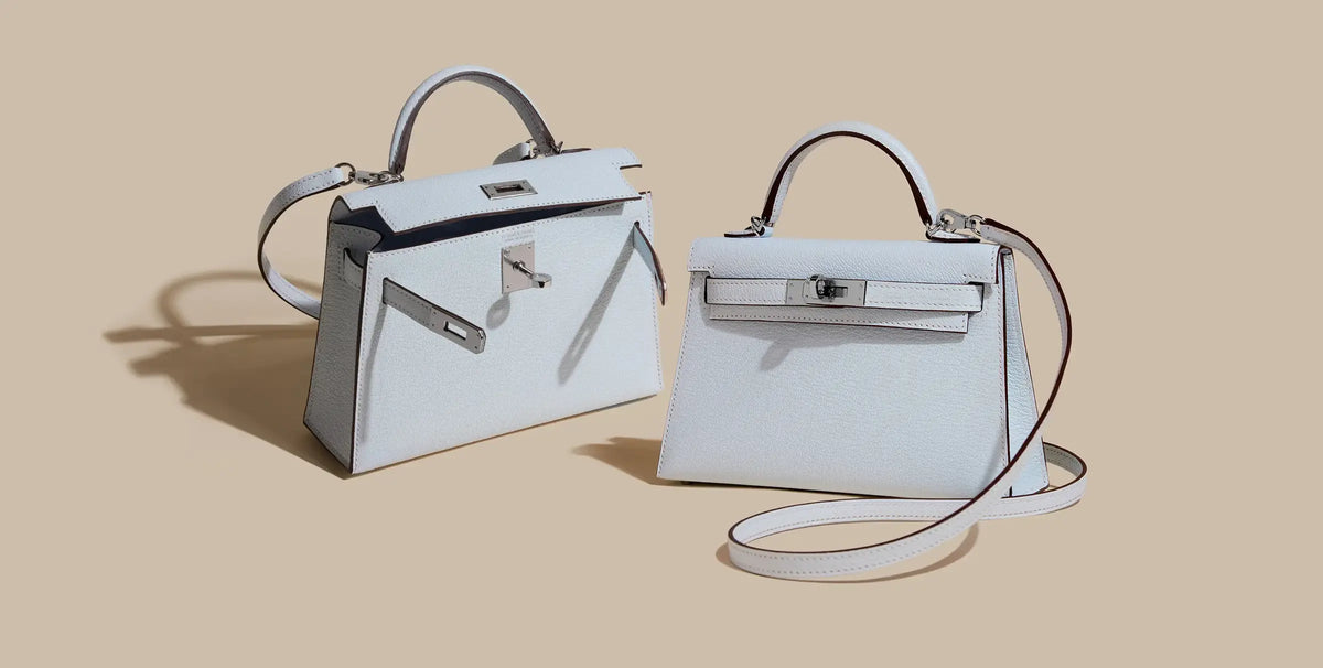 Two light blue leather Hermès handbags with silver hardware, curated Pre-loved Luxury by Myluxe in Helsinki.
