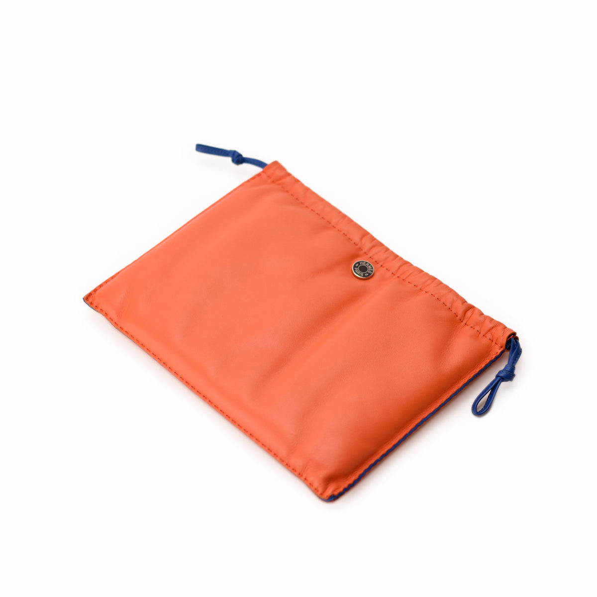 Orange leather luxury dust bag with blue drawstring. curated Pre-loved Luxury by Myluxe in Helsinki.