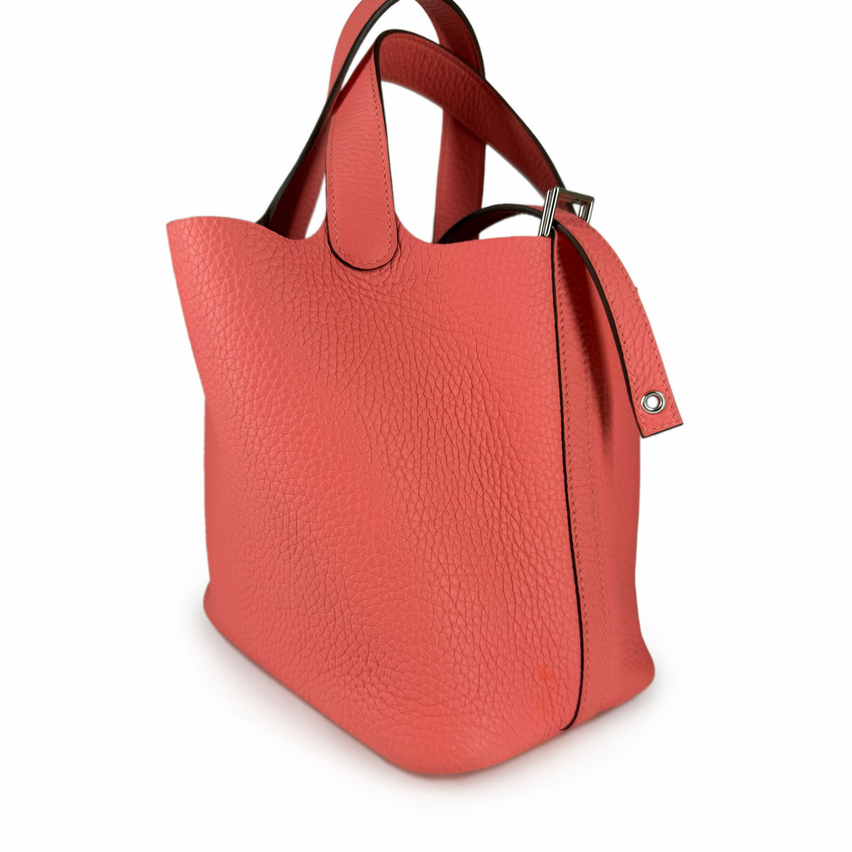 Coral pink pebbled leather tote bag with top handles, curated Pre-loved Luxury by Myluxe in Helsinki.
