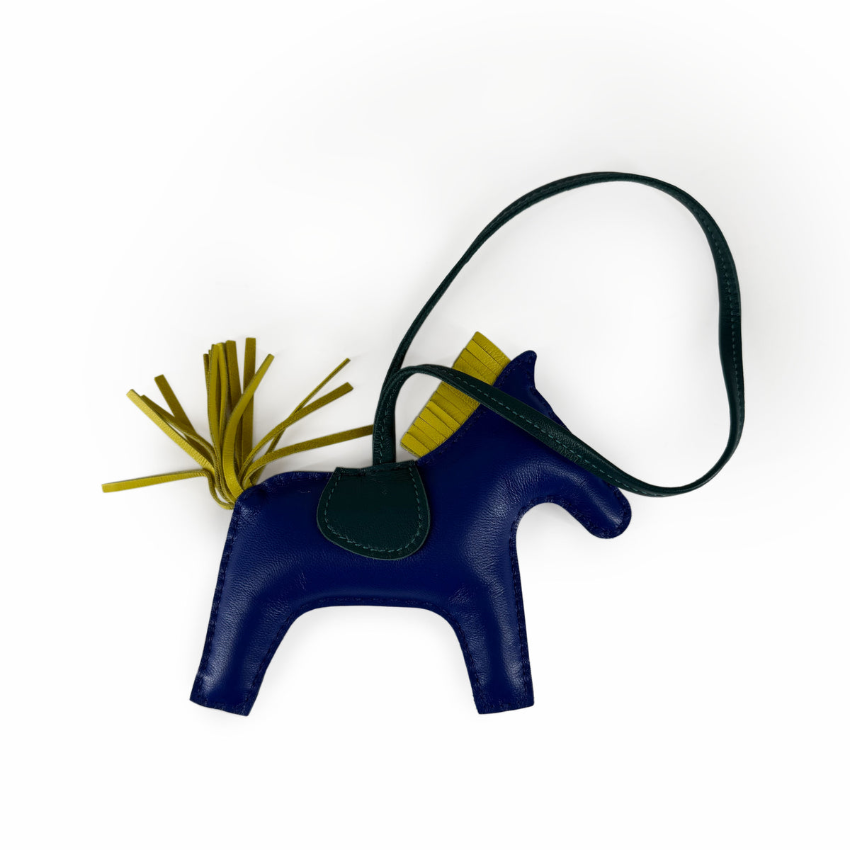 Blue leather horse-shaped crossbody bag with yellow fringe, curated Pre-loved Luxury by Myluxe in Helsinki.