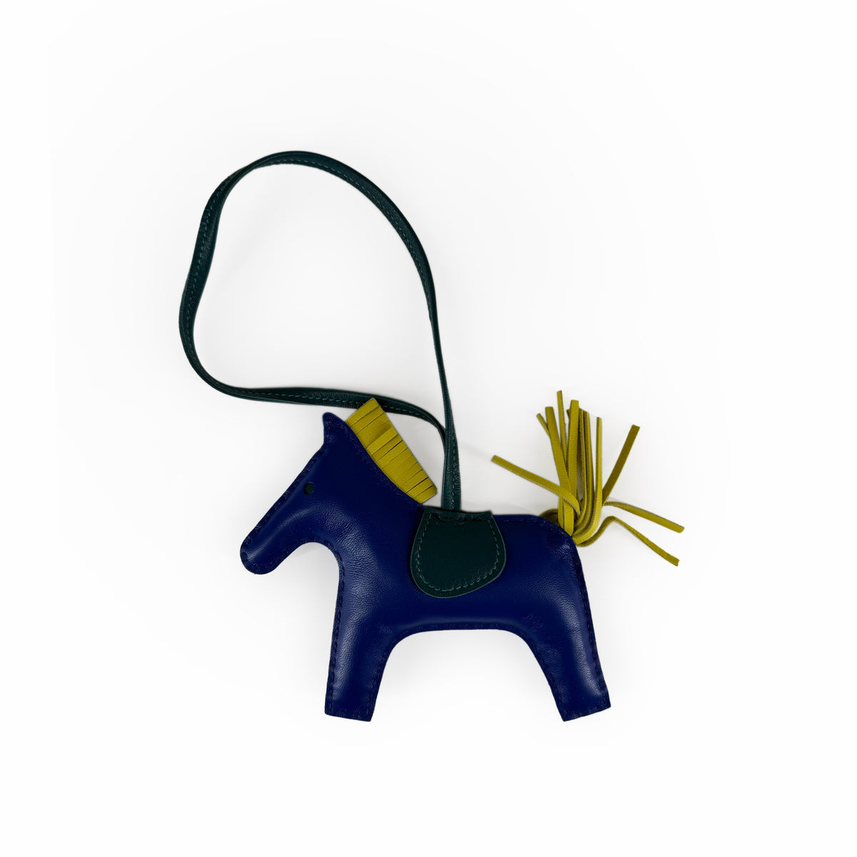 Blue leather horse-shaped coin purse with yellow fringe detail, curated Pre-loved Luxury by Myluxe in Helsinki.