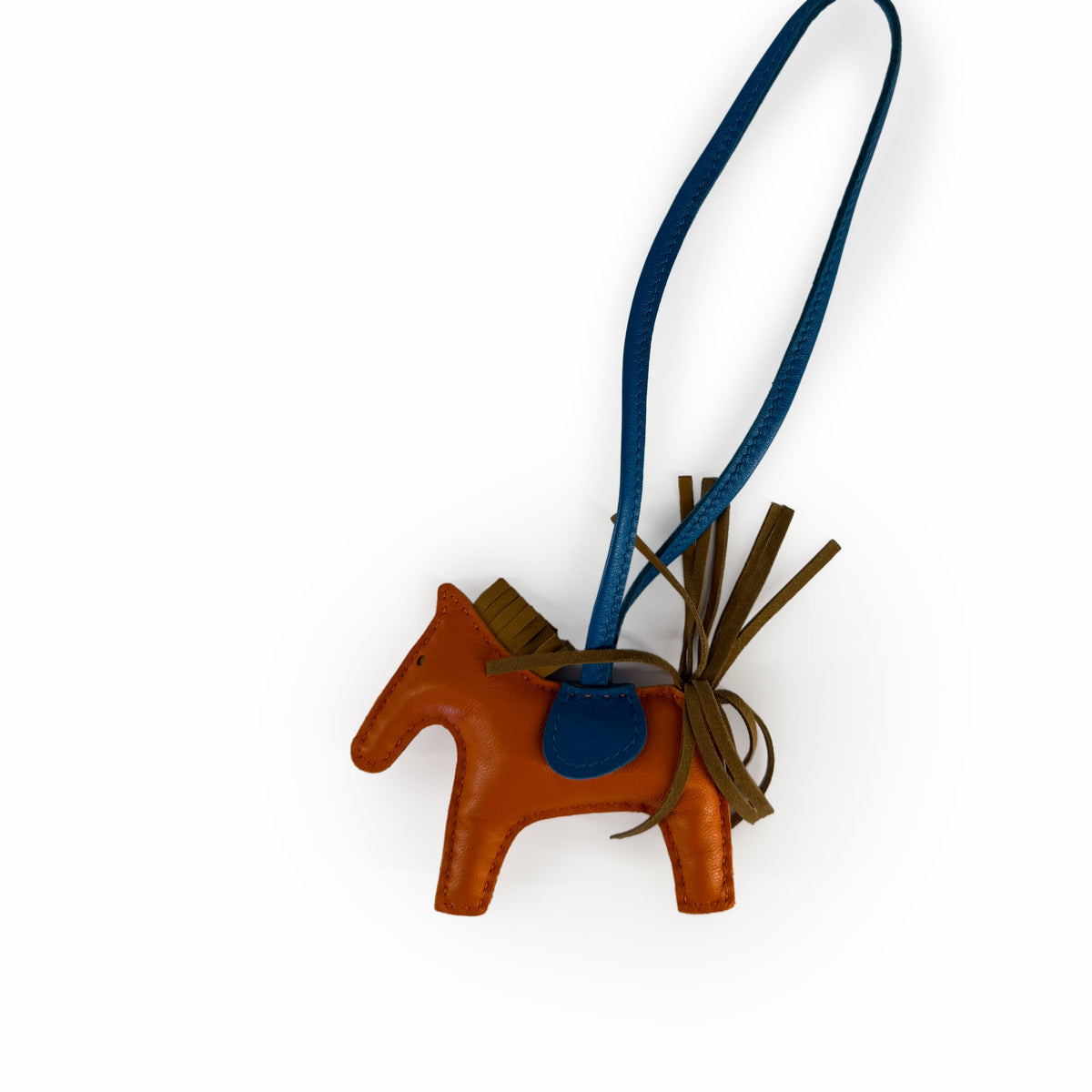 Brown leather horse keychain with blue strap, curated Pre-loved Luxury by Myluxe in Helsinki.