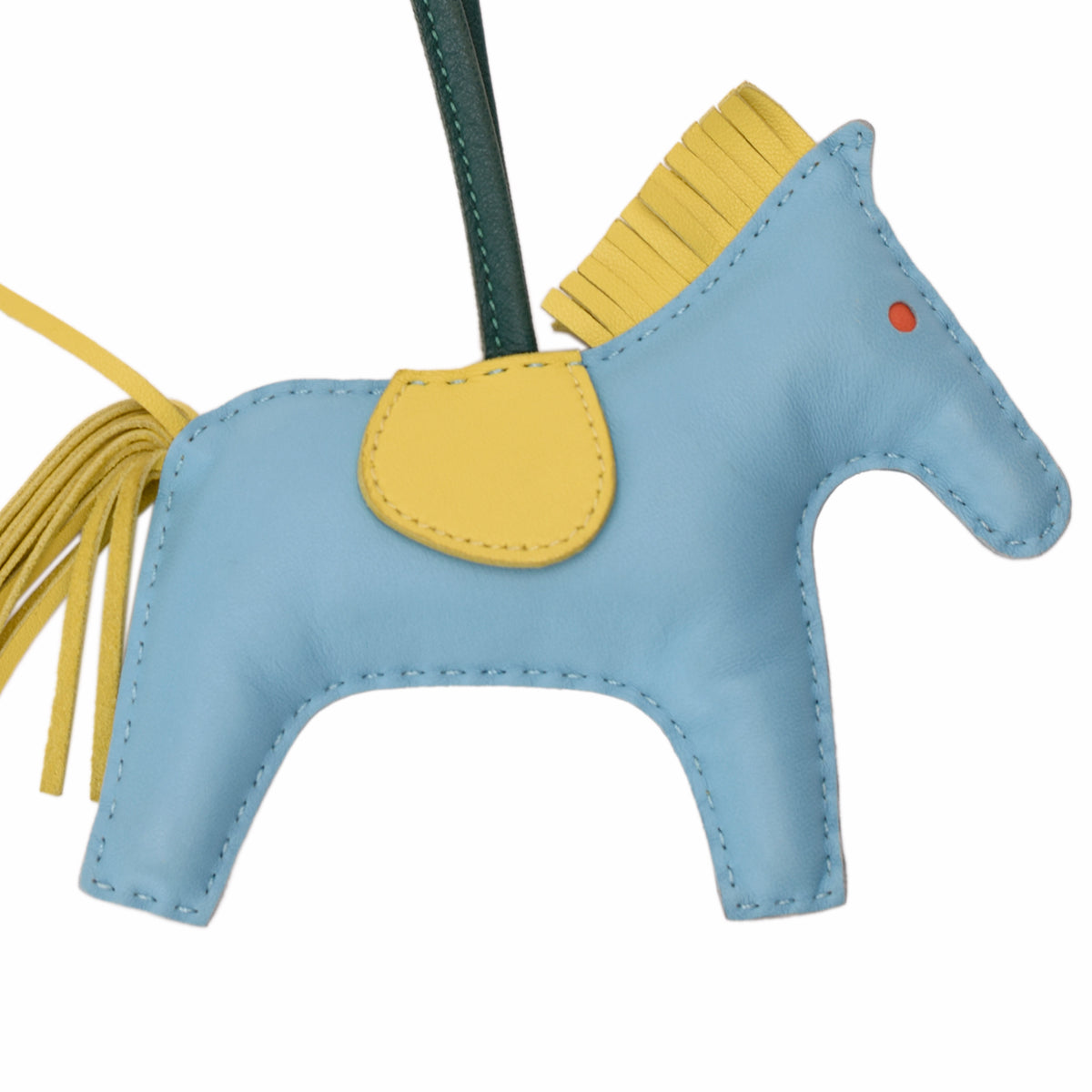 Light blue leather horse charm with yellow saddle and mane, curated Pre-loved Luxury by Myluxe in Helsinki.