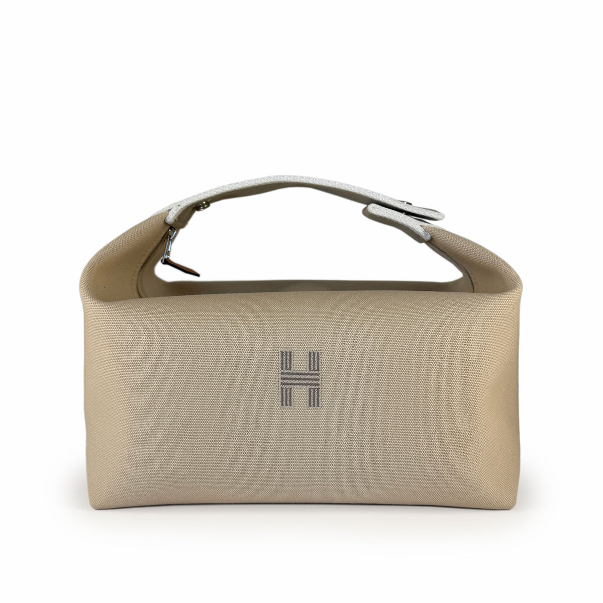 Beige textured leather handbag with silver hardware, curated Pre-loved Luxury by Myluxe in Helsinki.