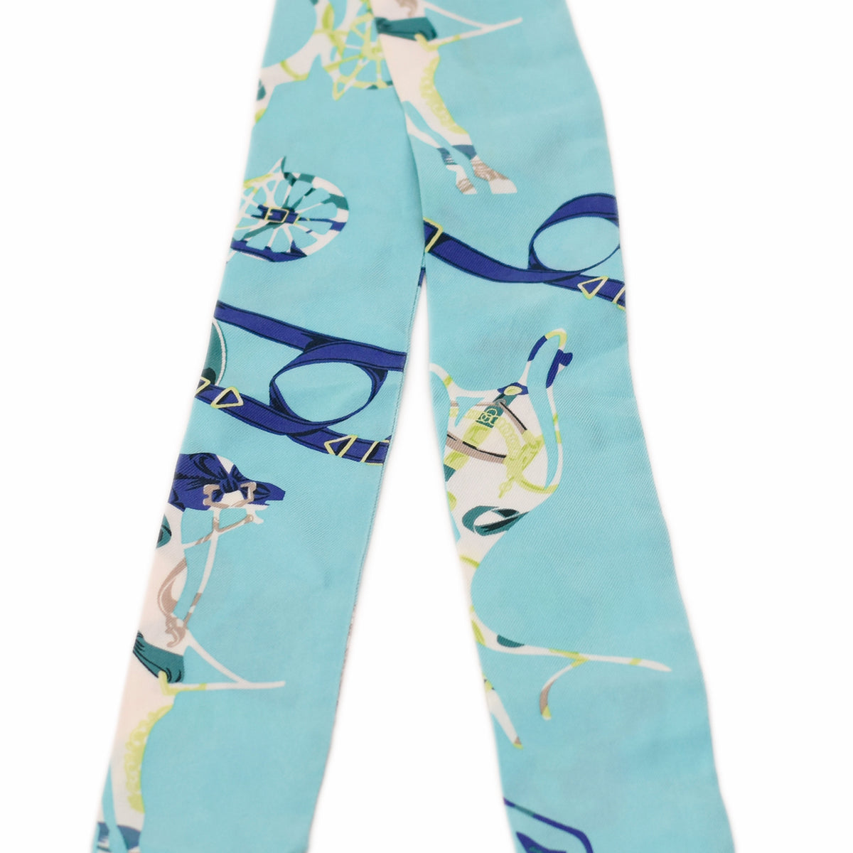 Light blue silk scarf with abstract blue and yellow patterns, curated Pre-loved Luxury by Myluxe in Helsinki.