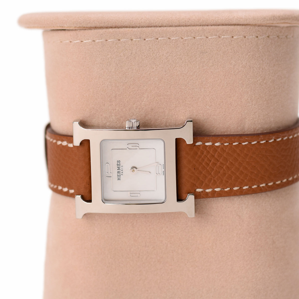 Hermès rectangular silver watch with brown textured leather strap. curated Pre-loved Luxury by Myluxe in Helsinki.