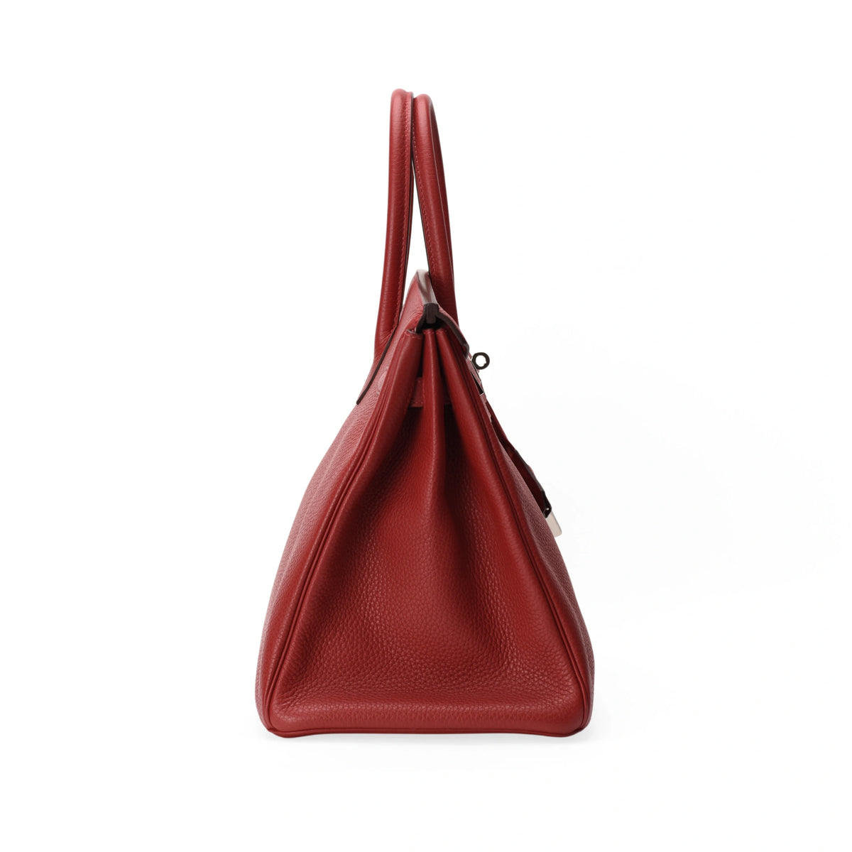 Side view of a red Hermès Birkin 35 in Clemence leather, curated Pre-loved Luxury by Myluxe in Helsinki.