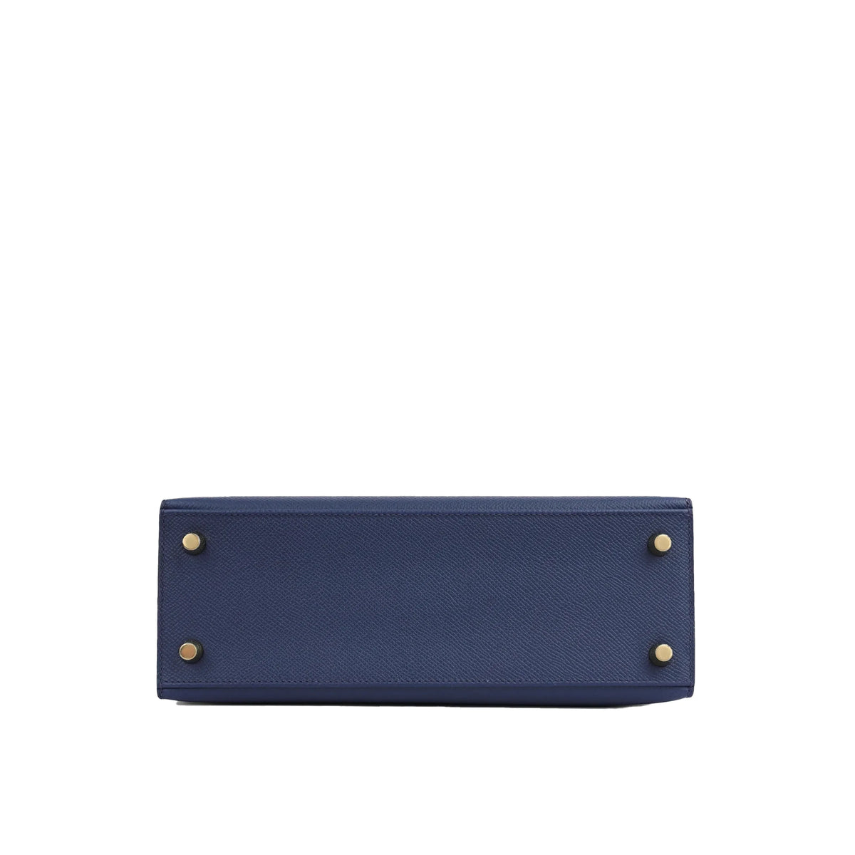 Bottom view of a navy blue textured leather handbag with gold-tone metal feet, curated Pre-loved Luxury by Myluxe in Helsinki.