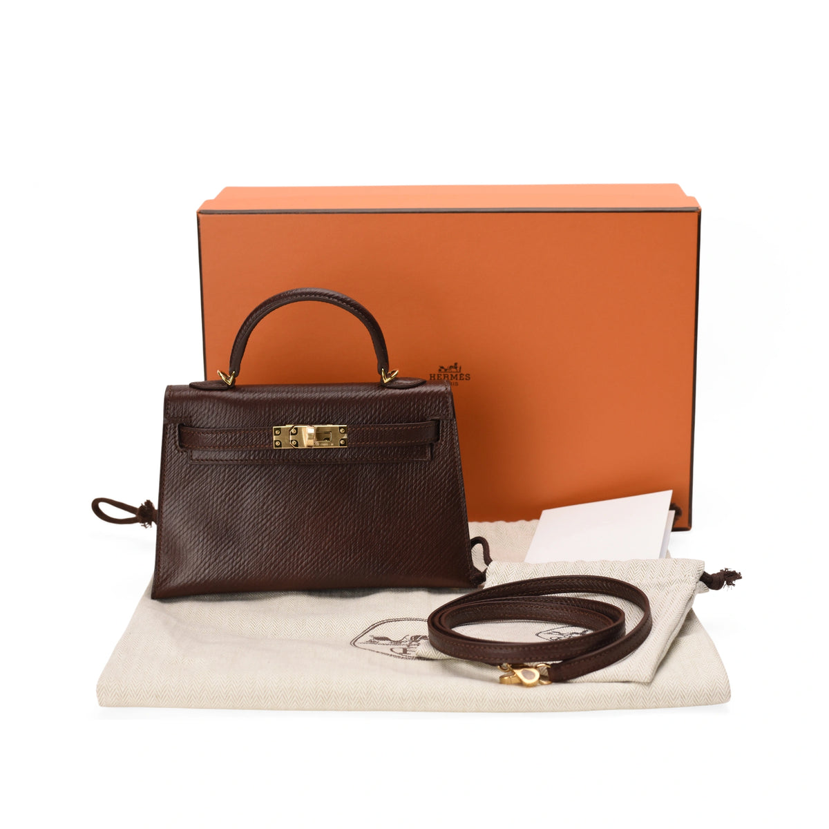Hermès Mini Kelly Sellier in Volynka Terre leather with gold hardware. curated Pre-loved Luxury by Myluxe in Helsinki.