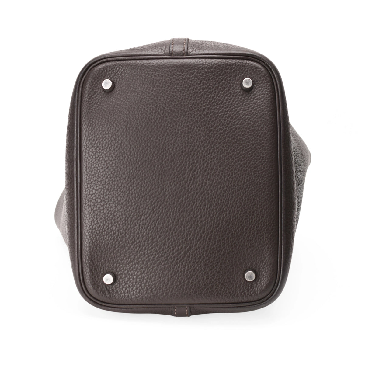 Bottom view of brown Clemence leather Hermès Picotin 22 with four metal feet. Curated Pre-loved Luxury by Myluxe in Helsinki.
