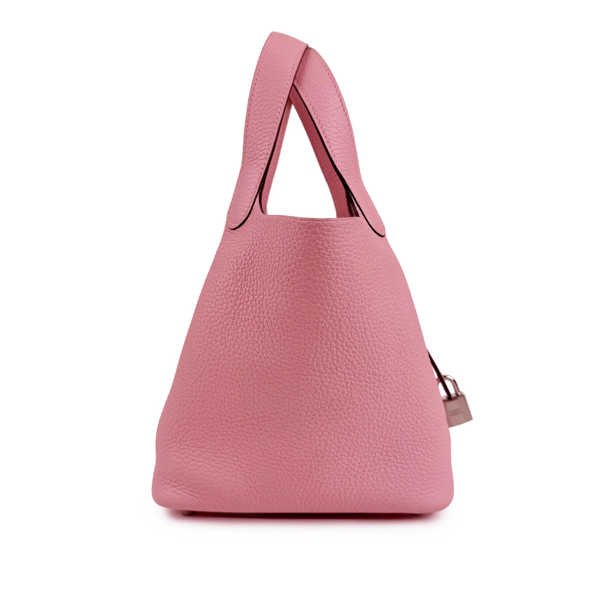 Pink pebbled leather tote bag with structured top handles, curated Pre-loved Luxury by Myluxe in Helsinki.
