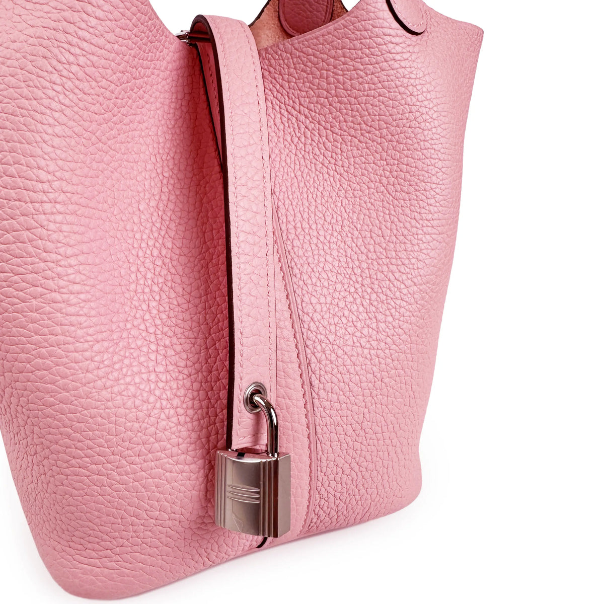 Pink pebbled leather bucket bag with silver padlock detail, curated Pre-loved Luxury by Myluxe in Helsinki.