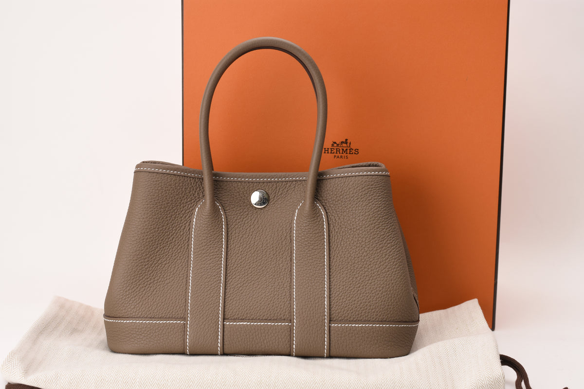 Hermès Neo Garden Togo leather handbag in Etoupe color with PHW hardware. curated Pre-loved Luxury by Myluxe in Helsinki.