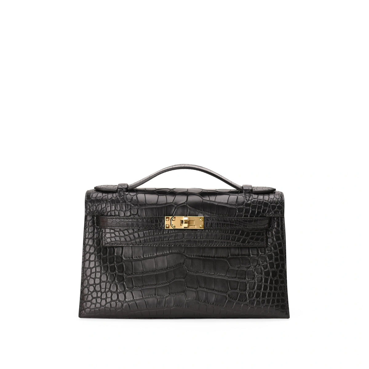 Hermès Kelly Pochette black matte alligator leather with gold hardware. curated Pre-loved Luxury by Myluxe in Helsinki.
