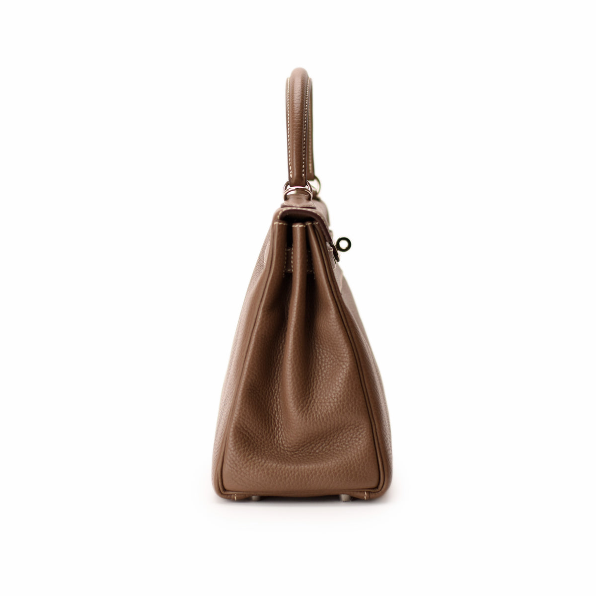 Brown pebbled leather designer handbag with top handle. curated Pre-loved Luxury by Myluxe in Helsinki.