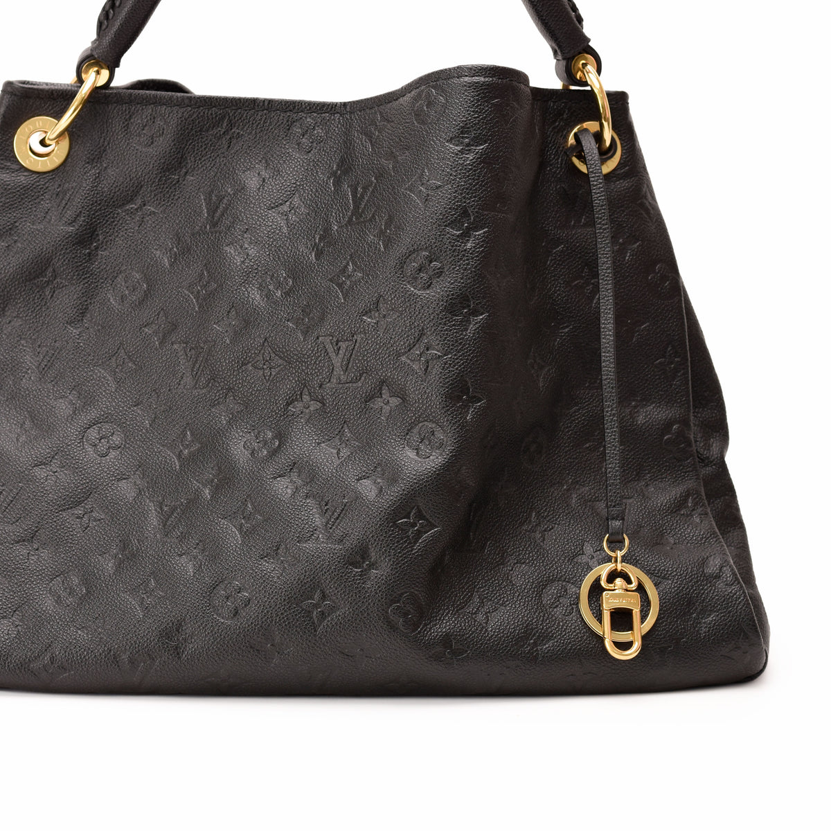 Black monogram leather Louis Vuitton handbag with gold hardware, curated Pre-loved Luxury by Myluxe in Helsinki.