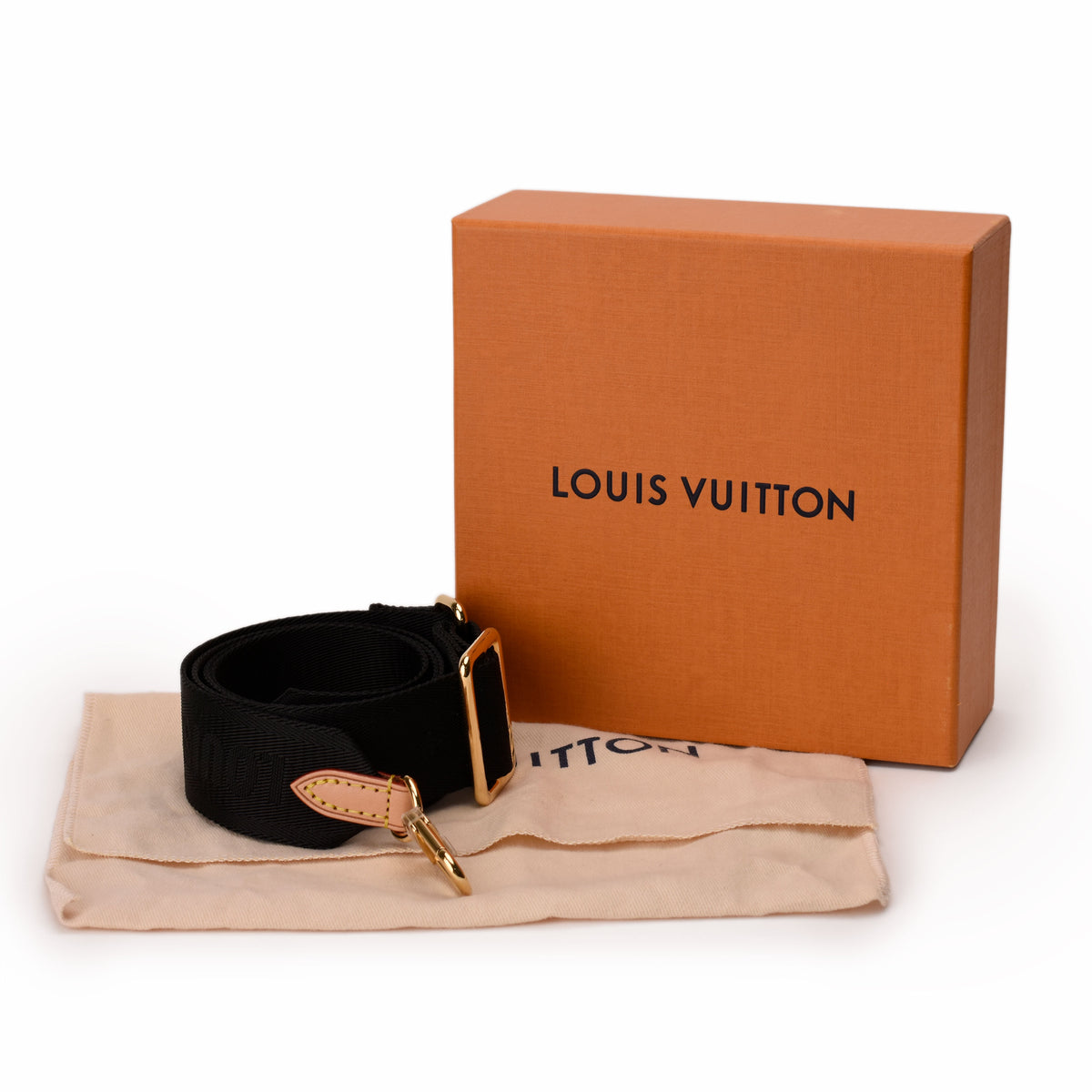 Black Louis Vuitton canvas belt with gold-tone buckle and storage box. curated Pre-loved Luxury by Myluxe in Helsinki.