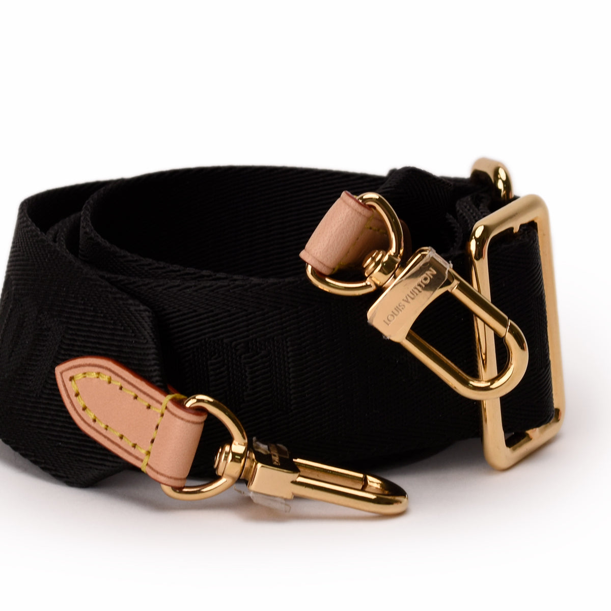 Black Louis Vuitton canvas strap with gold-tone hardware and tan leather accents. curated Pre-loved Luxury by Myluxe in Helsinki.