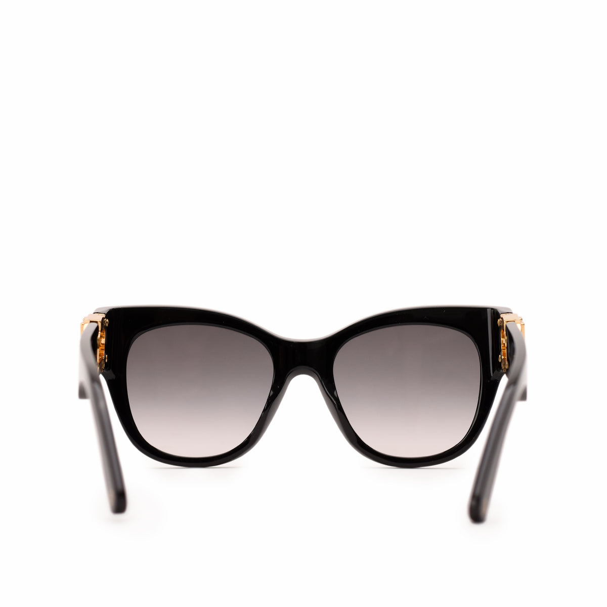 Black oversized cat-eye sunglasses with gold-tone metal accents, curated Pre-loved Luxury by Myluxe in Helsinki.