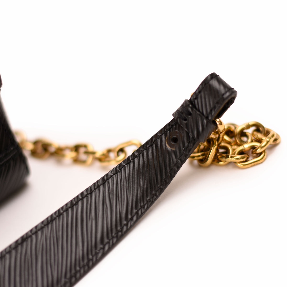 Black textured leather strap with gold-tone metal chain detail. curated Pre-loved Luxury by Myluxe in Helsinki.