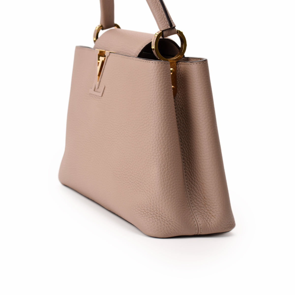 Beige grained leather luxury handbag with gold hardware, curated Pre-loved Luxury by Myluxe in Helsinki.