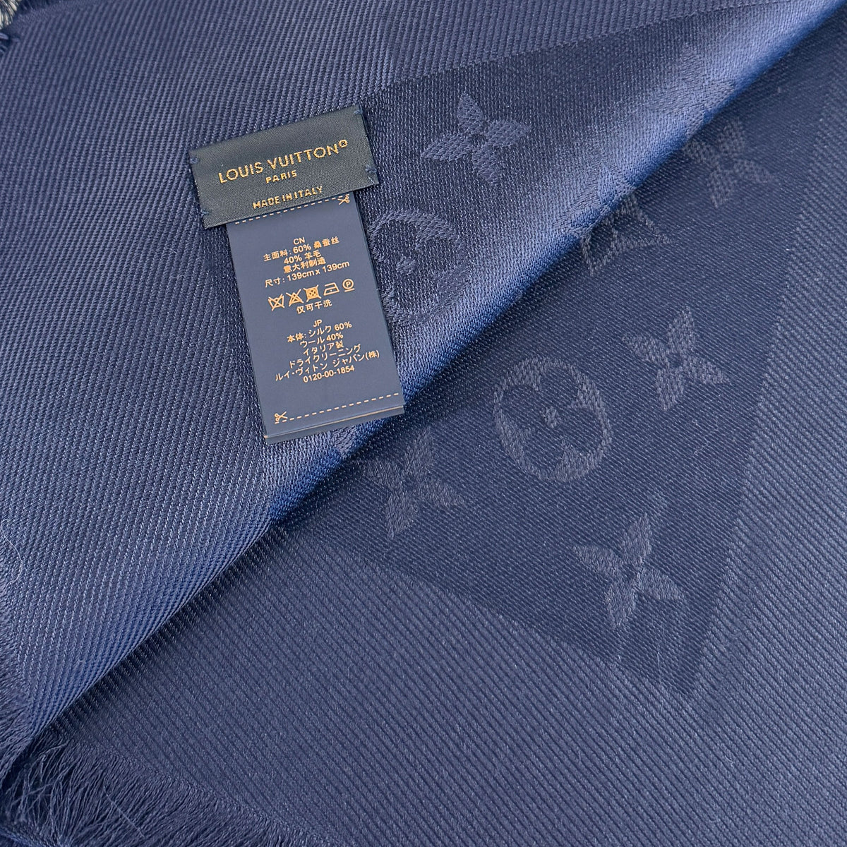Louis Vuitton navy blue silk and wool monogram scarf, curated Pre-loved Luxury by Myluxe in Helsinki.