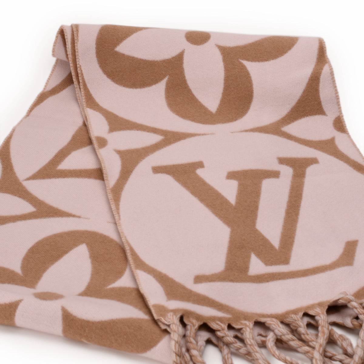 Louis Vuitton monogram pattern beige and tan wool scarf with fringe, curated Pre-loved Luxury by Myluxe in Helsinki.