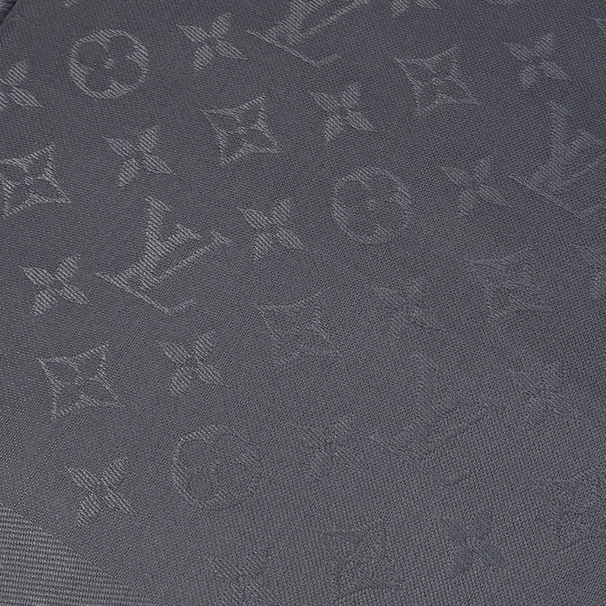 Grey monogrammed canvas luxury pattern, curated Pre-loved Luxury by Myluxe in Helsinki.