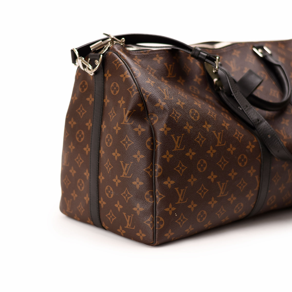 Louis Vuitton brown monogram canvas duffel bag. curated Pre-loved Luxury by Myluxe in Helsinki.