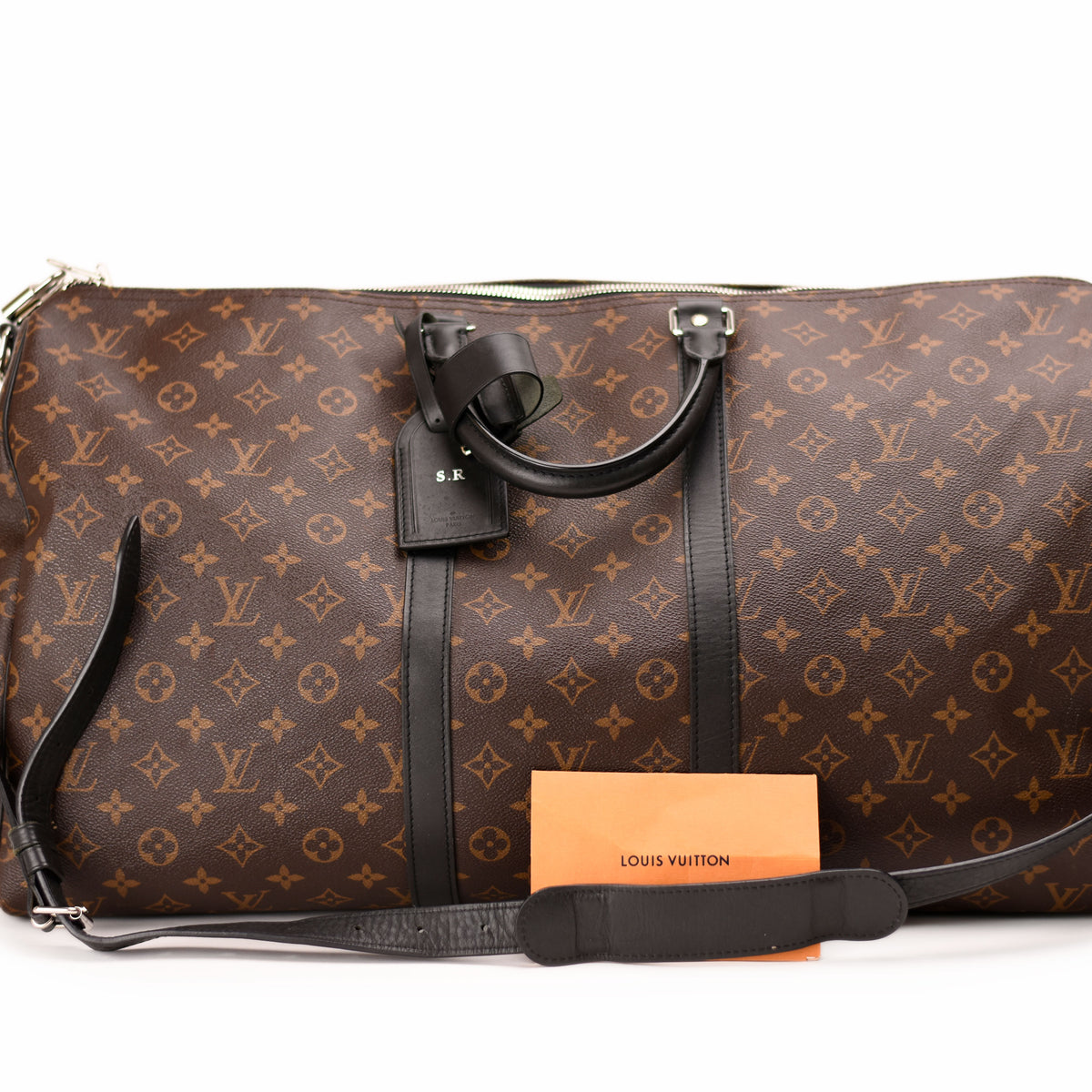 Louis Vuitton Monogram canvas brown duffel bag with leather trim. curated Pre-loved Luxury by Myluxe in Helsinki.
