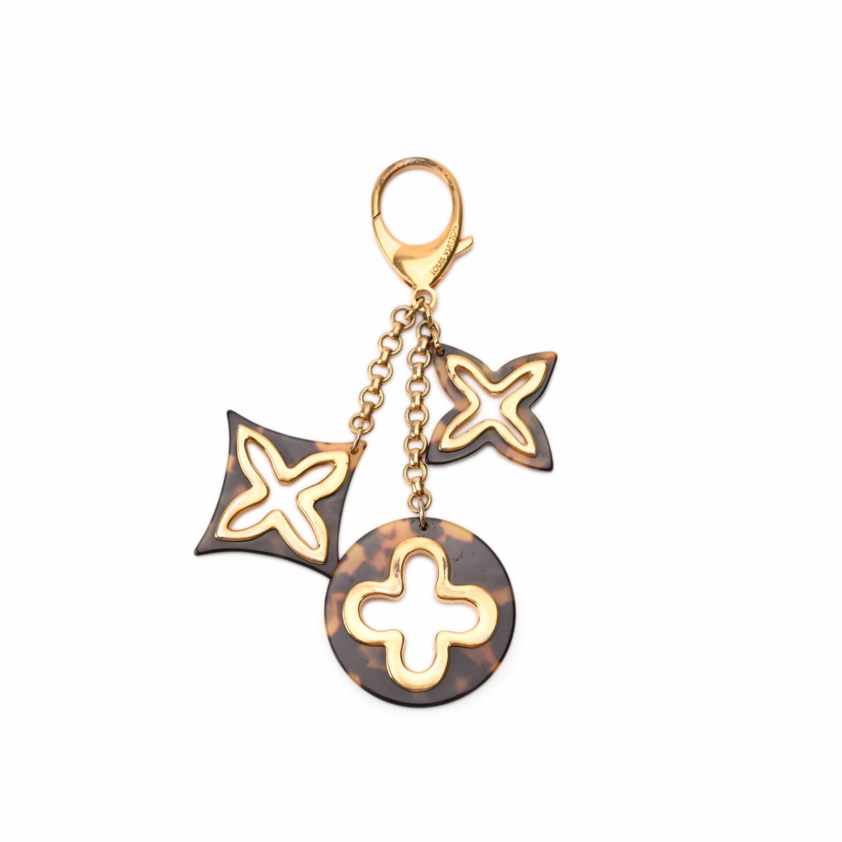 Louis Vuitton tortoiseshell and gold-tone charm keychain, curated Pre-loved Luxury by Myluxe in Helsinki.