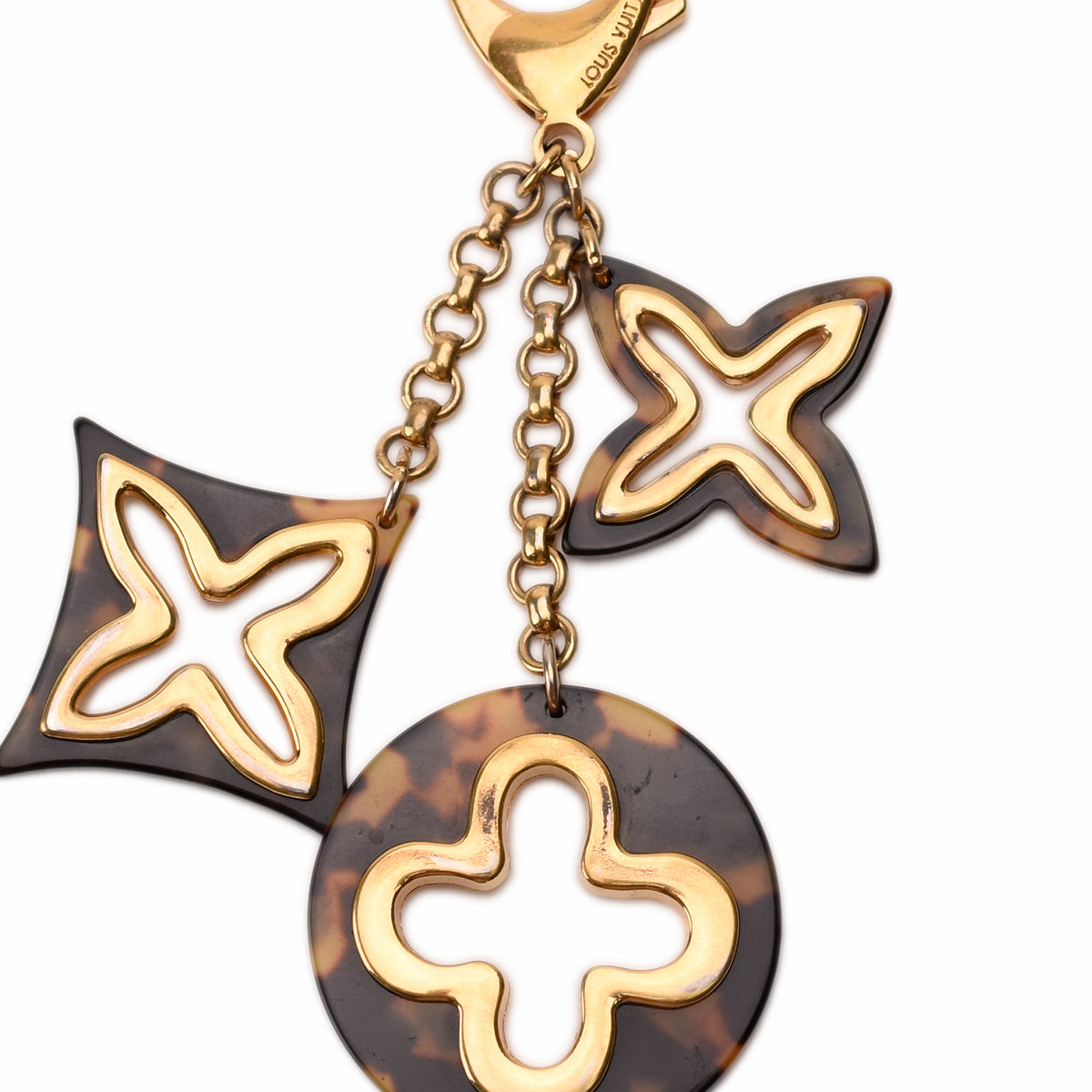 Louis Vuitton tortoiseshell and gold-tone charm keychain, curated Pre-loved Luxury by Myluxe in Helsinki.
