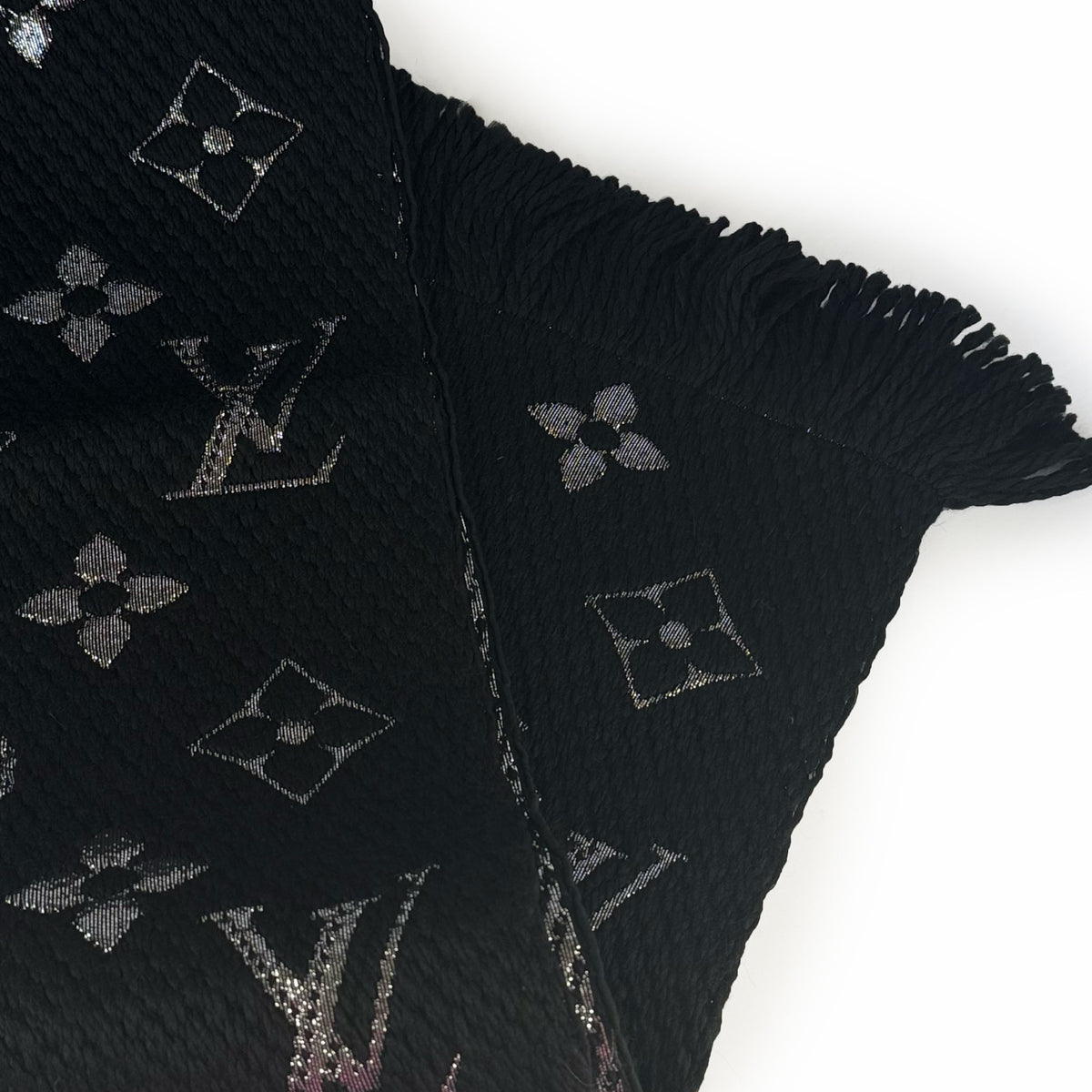 Black silk Louis Vuitton monogram pattern scarf with delicate fringe, curated Pre-loved Luxury by Myluxe in Helsinki.