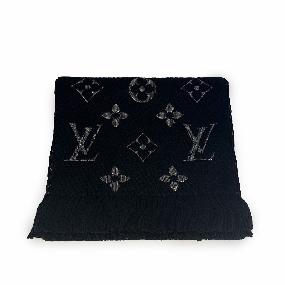Black textured fabric with silver Louis Vuitton monogram pattern, curated Pre-loved Luxury by Myluxe in Helsinki.