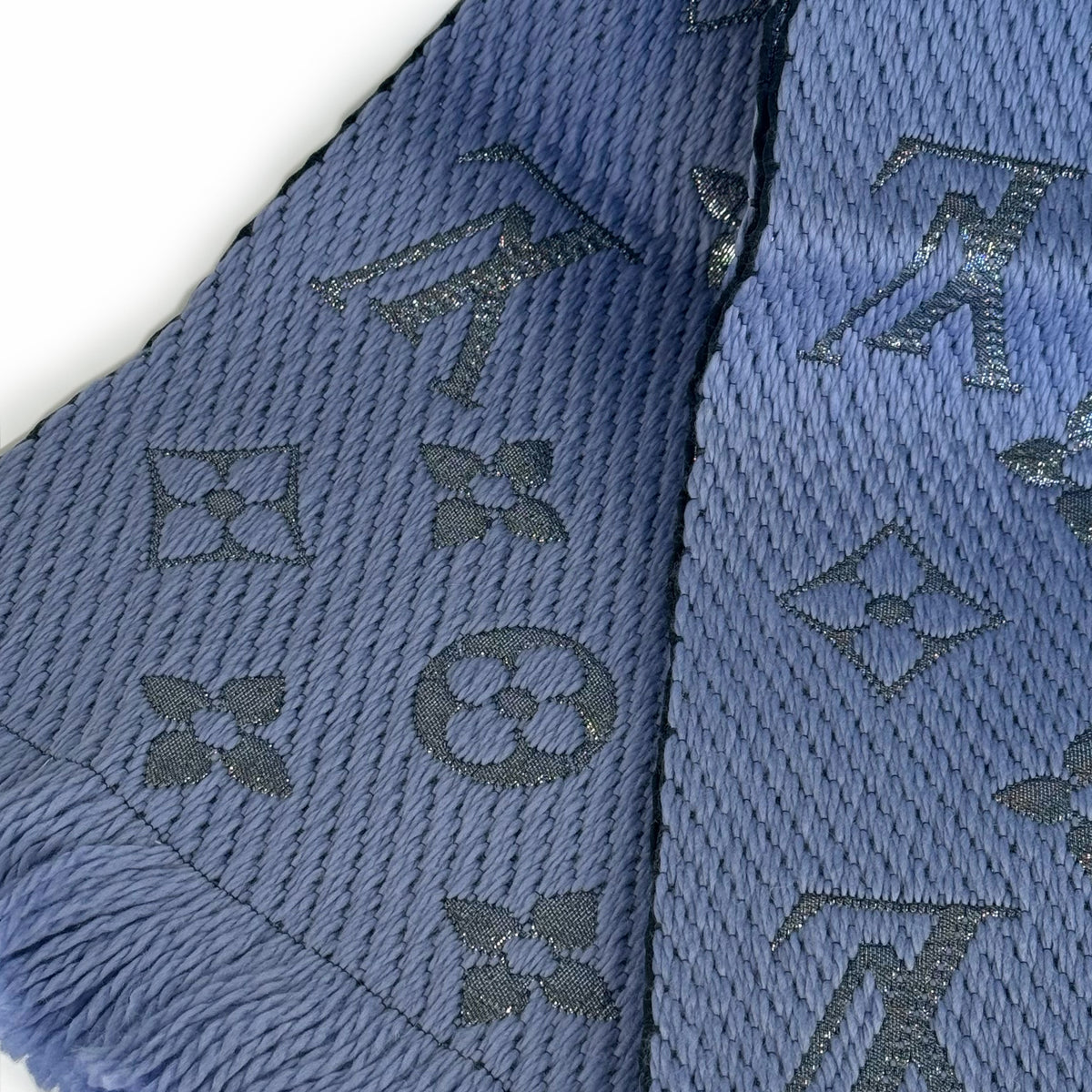 Blue textured Louis Vuitton monogram pattern scarf with fringe, curated Pre-loved Luxury by Myluxe in Helsinki.