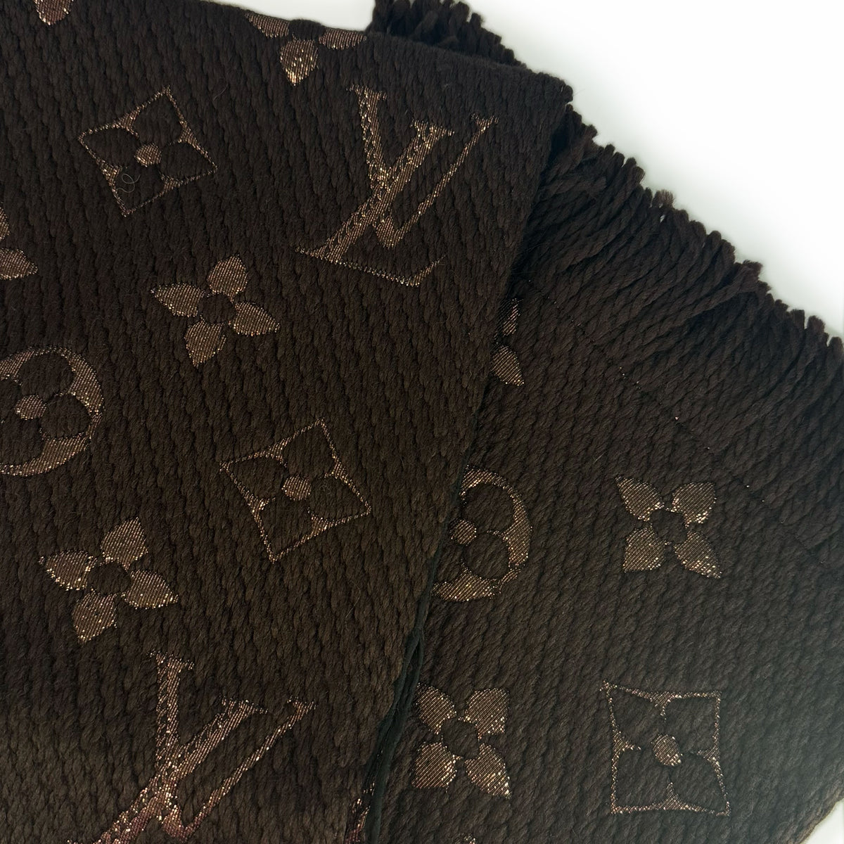 Brown Louis Vuitton monogram pattern fabric with fringed edges, curated Pre-loved Luxury by Myluxe in Helsinki.
