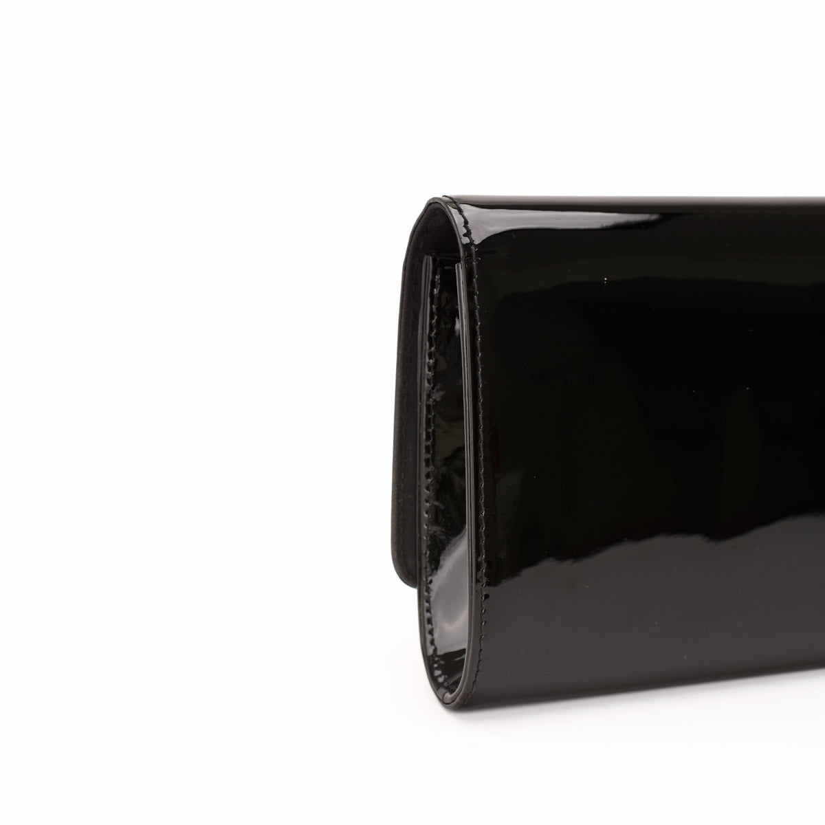 Black patent leather luxury clutch bag, curated Pre-loved Luxury by Myluxe in Helsinki.