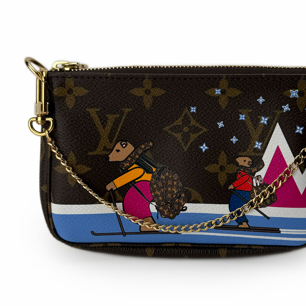 Louis Vuitton monogram canvas pouch with colorful skiing bear illustration, curated Pre-loved Luxury by Myluxe in Helsinki.