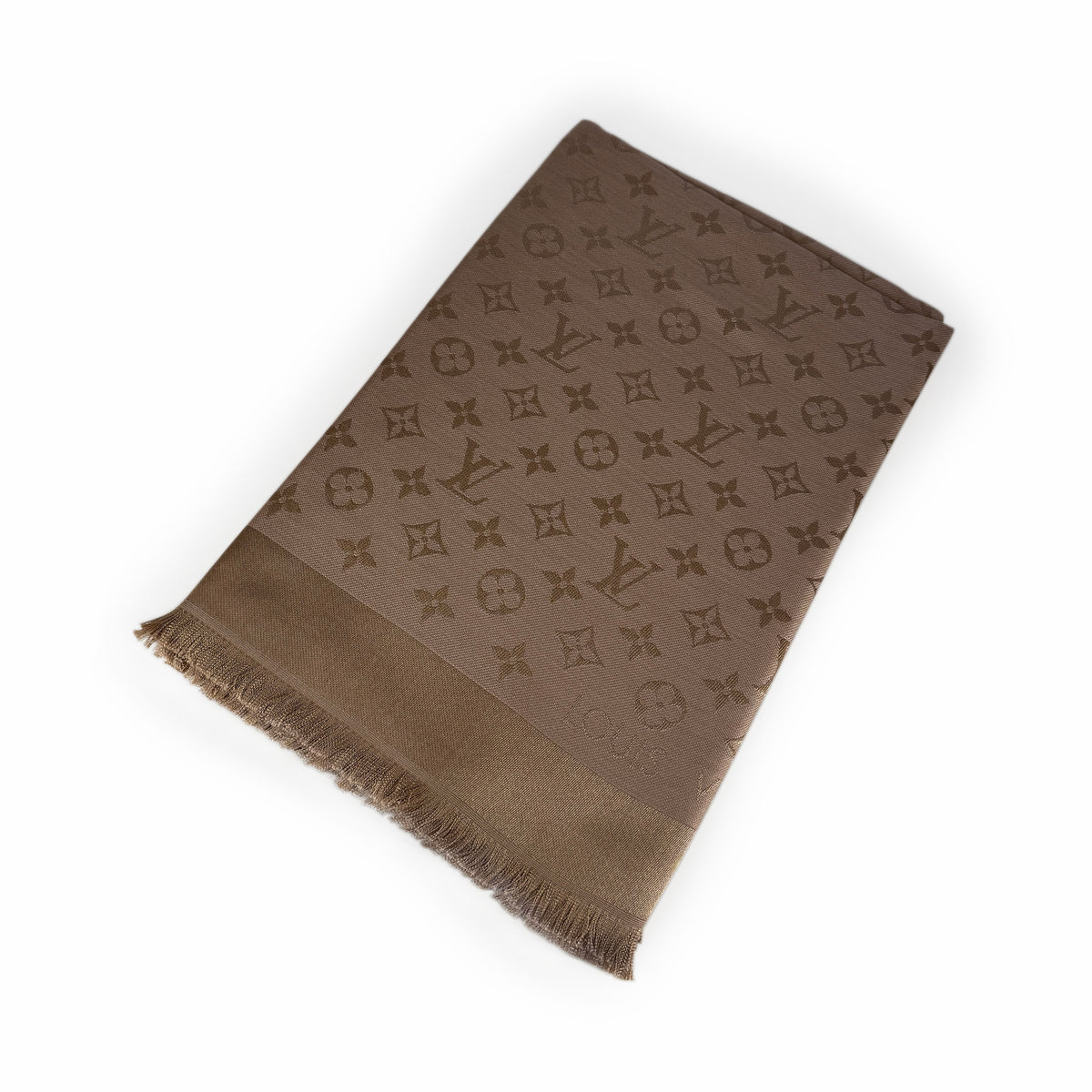 Brown Louis Vuitton monogram pattern silk scarf with fringed edges, curated Pre-loved Luxury by Myluxe in Helsinki.