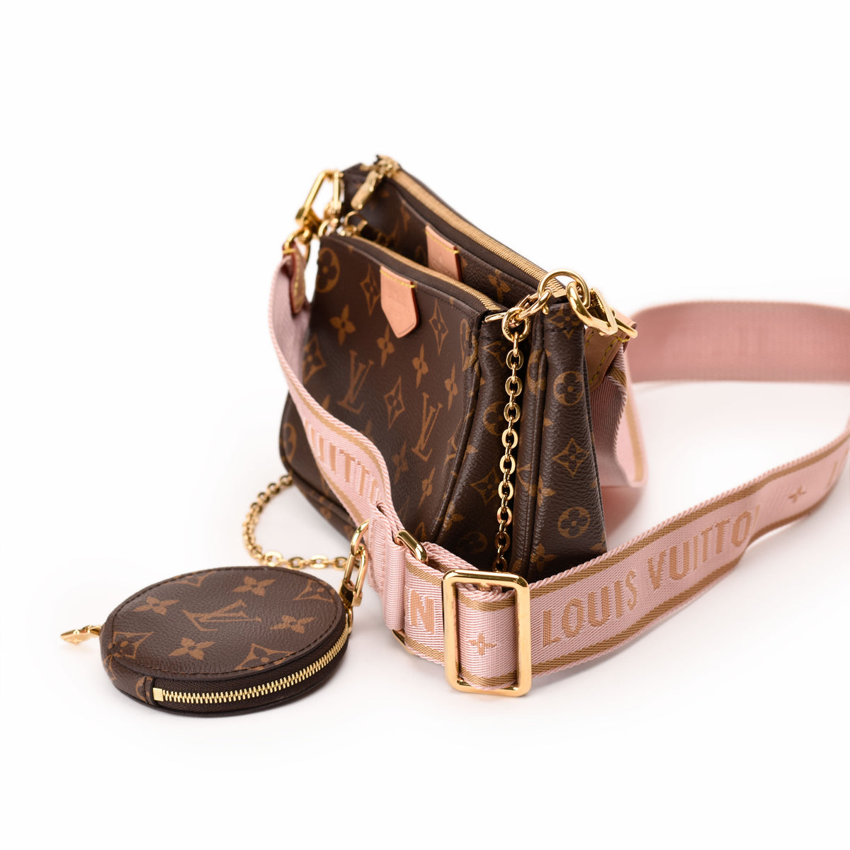 Louis Vuitton Monogram canvas crossbody bag with pink strap and coin purse. curated Pre-loved Luxury by Myluxe in Helsinki.